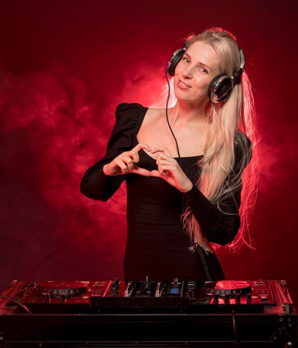 woman-dj-console-showing-heart-shape_23-2148543237